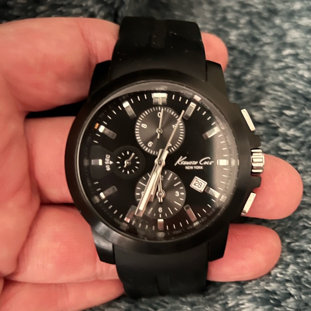 Kenneth Cole used Men’s Black and silver Watch stainless steel, water resistant.